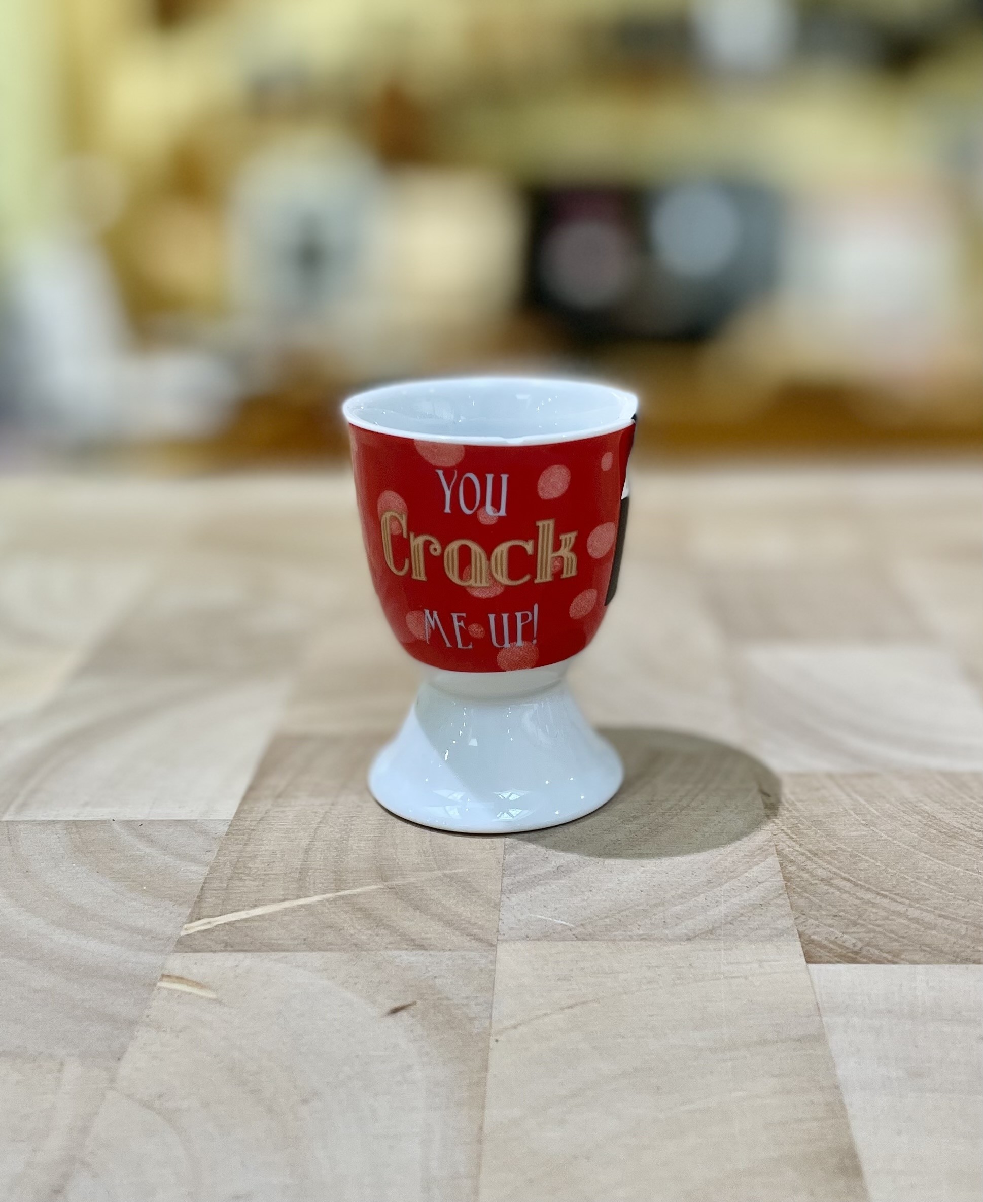 Buy the KitchenCraft Porcelain You Crack Me Up Egg Cup online at smithsofloughton.com